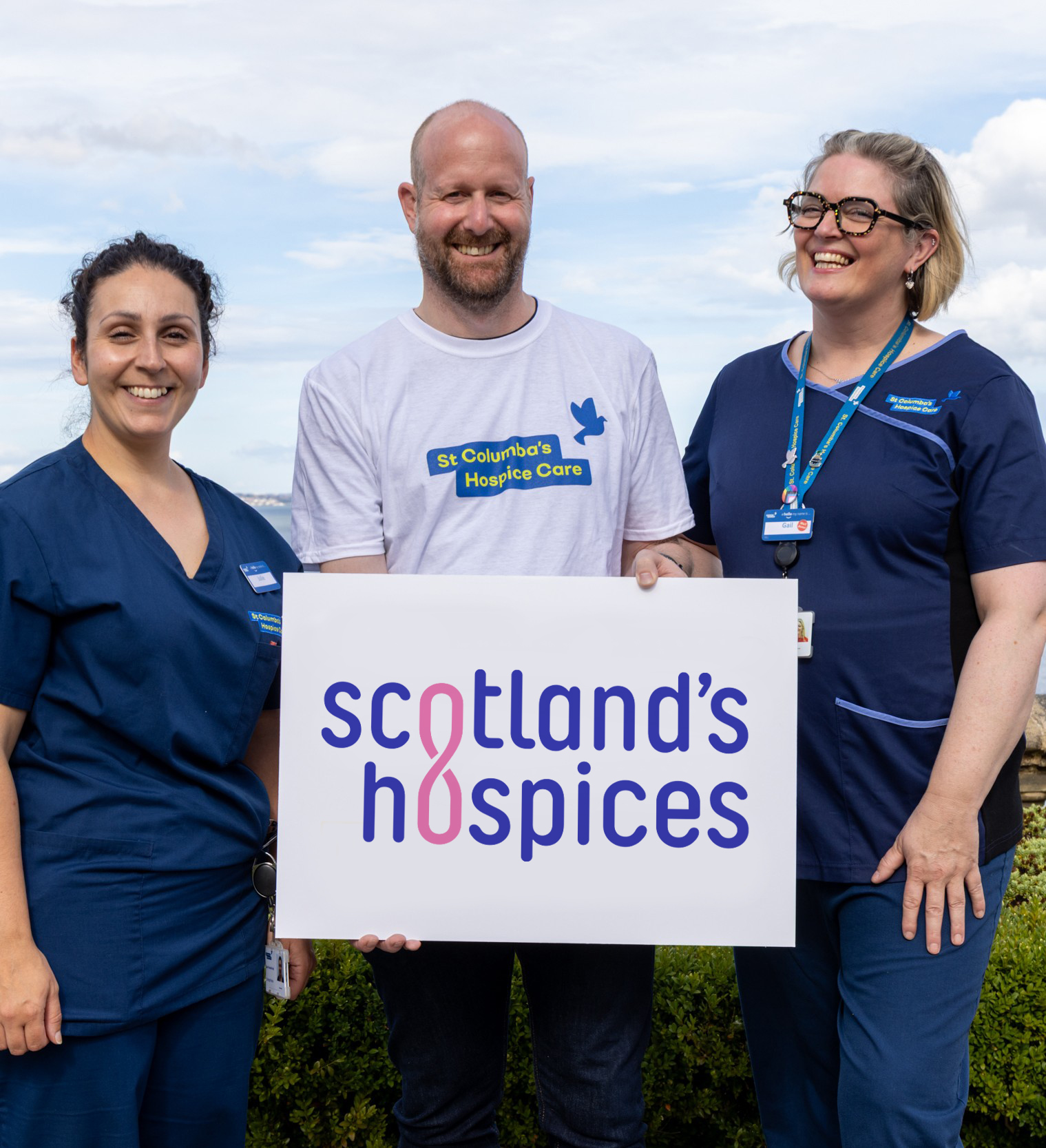Two hospices nurses smiling